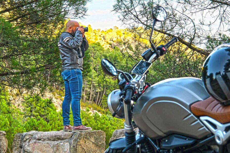 Motorcyclist taking picture